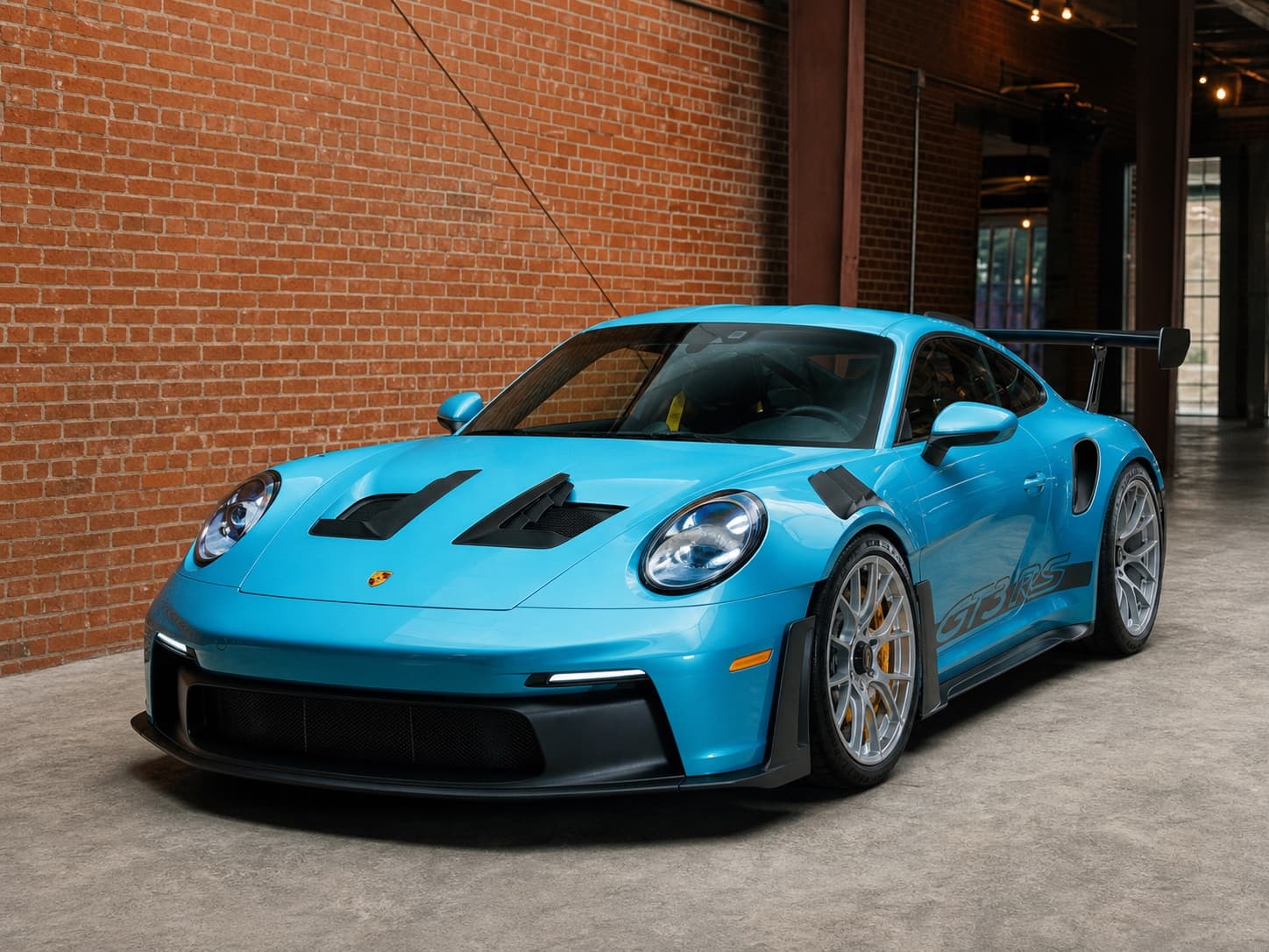 Turquoise Porsche inside the Speed House garage