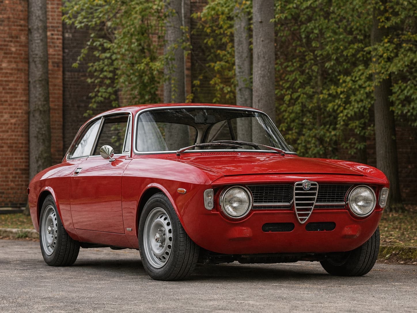 Red Alfa Romeo Giulia Sprint showing its preserved finish